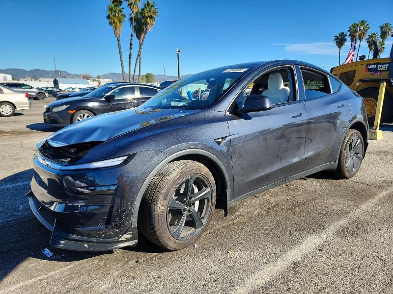 TESLA MODEL Y 2026 with VIN 7SAYGDEE4TF408018 - Photo from auction