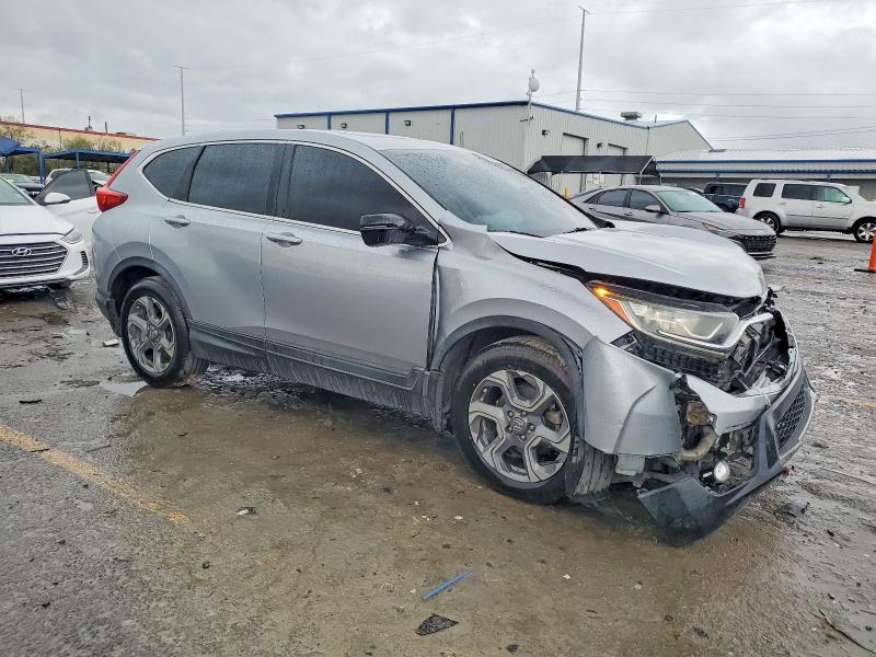 Photo 4 from auction – 2017 HONDA CR-V with VIN 7FARW1H8XHE029917