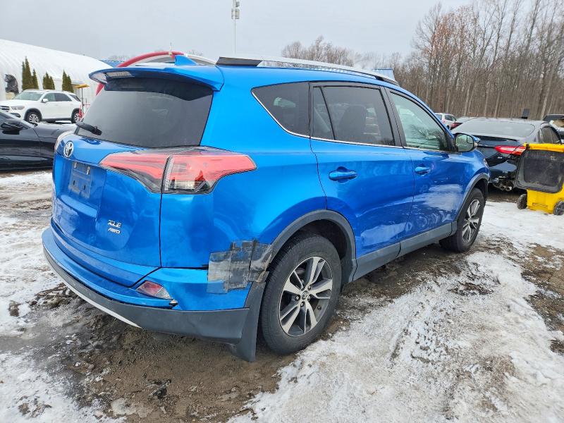 Photo 3 from auction – 2016 TOYOTA RAV4 XLE with VIN 2T3RFREV7GW442939