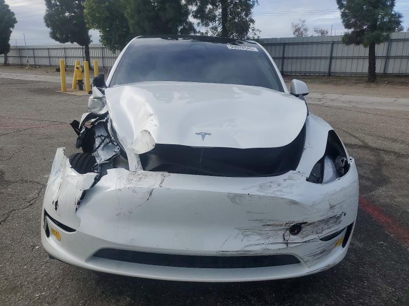Photo 5 from auction – 2022 TESLA MODEL Y with VIN 7SAYGDEF0NF489465