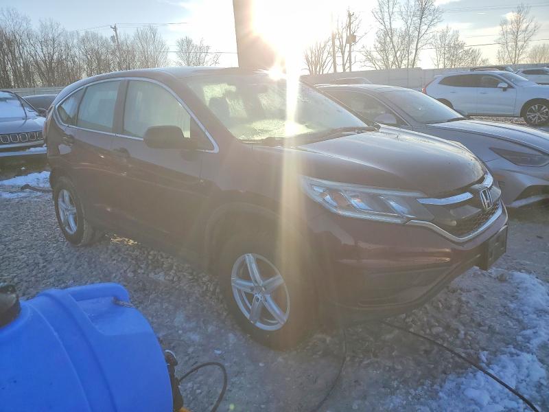 Photo 4 from auction – 2015 HONDA CR-V LX with VIN 5J6RM4H31FL017151