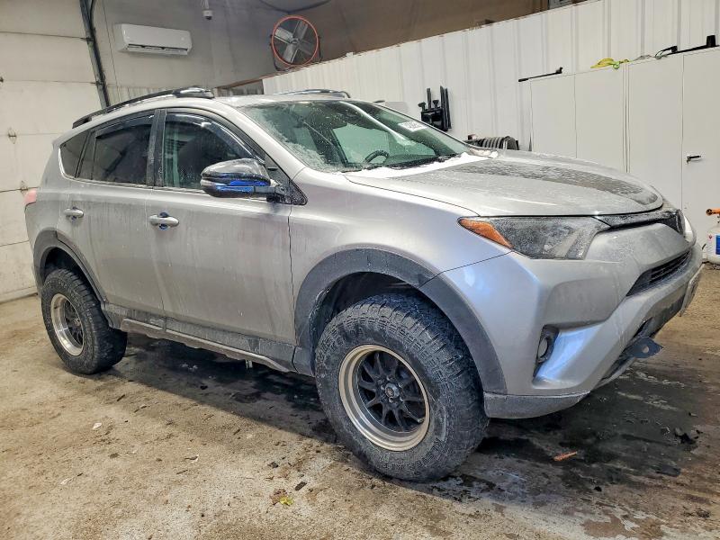Photo 4 from auction – 2018 TOYOTA RAV4 with VIN 2T3RFREV4JW775252