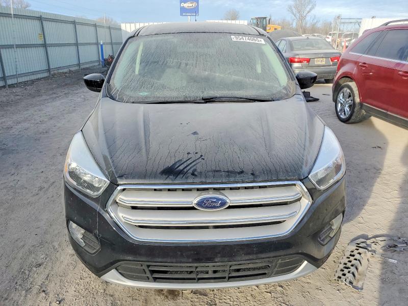 Photo 5 from auction – 2017 FORD ESCAPE SE with VIN 1FMCU0GD6HUC60476