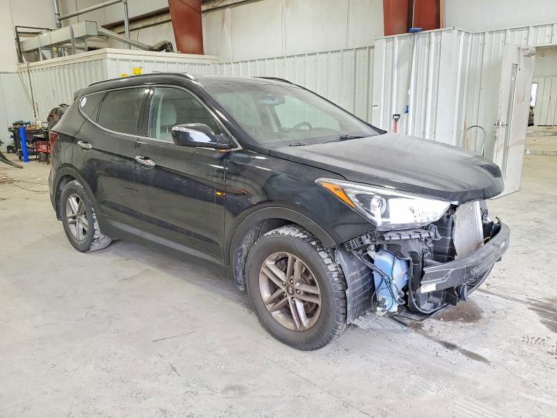 Photo 4 from auction – 2018 HYUNDAI SANTA FE S with VIN 5NMZU3LB6JH104116