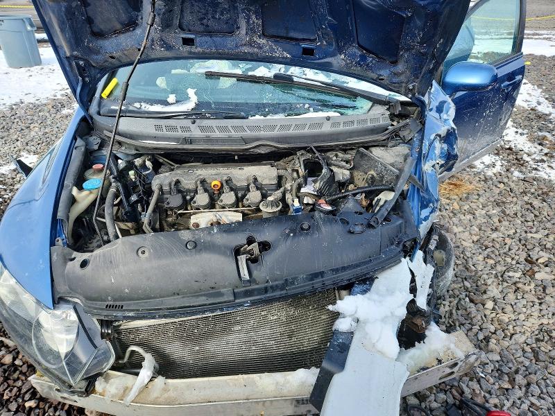 Photo 11 from auction – 2011 HONDA CIVIC LX-S with VIN 19XFA1F6XBE038368