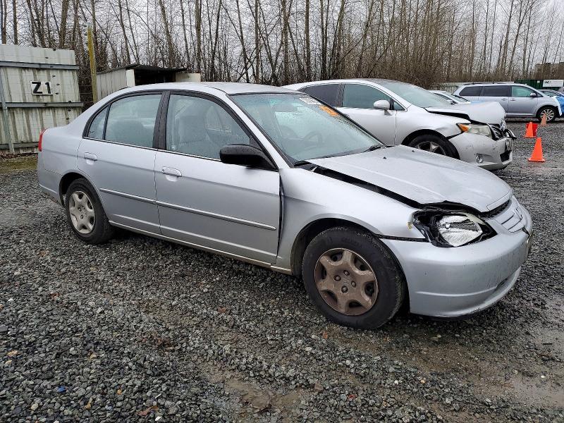 Photo 4 from auction – 2002 HONDA CIVIC LX with VIN JHMES165X2S006774