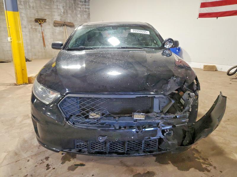 Foto 5 de la subasta – 2014 FORD TAURUS POL con VIN 1FAHP2MK8EG111924