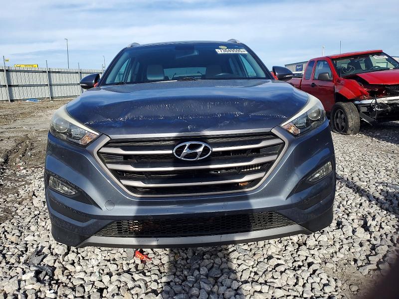 Photo 5 from auction – 2016 HYUNDAI TUCSON LIM with VIN KM8J3CA27GU211935