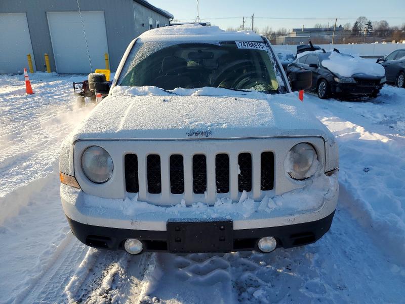 Photo 5 from auction – 2011 JEEP PATRIOT with VIN 1J4NT1GB2BD123251