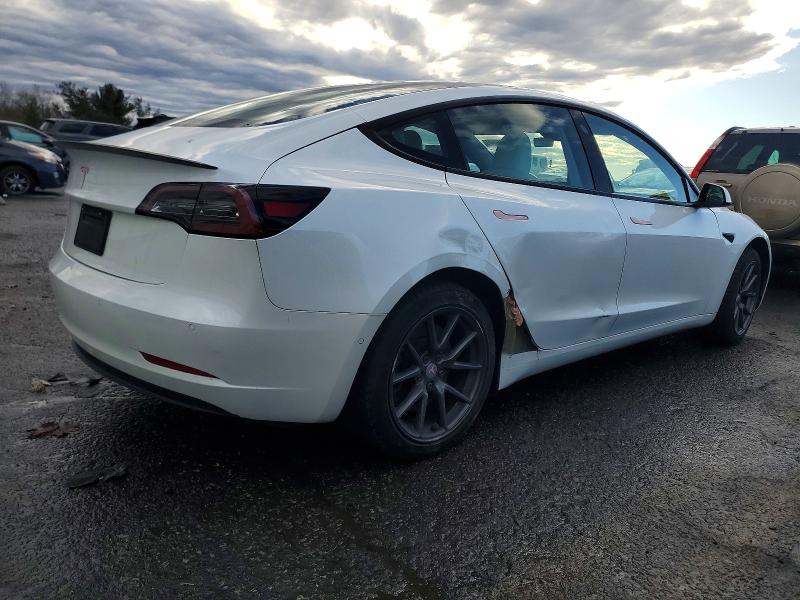 Photo 3 from auction – 2021 TESLA MODEL 3 with VIN 5YJ3E1EA2MF873360