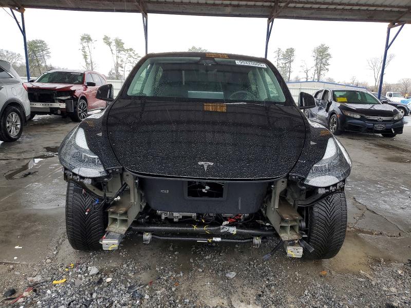 Photo 5 from auction – 2023 TESLA MODEL Y with VIN 7SAYGDEE7PA181202