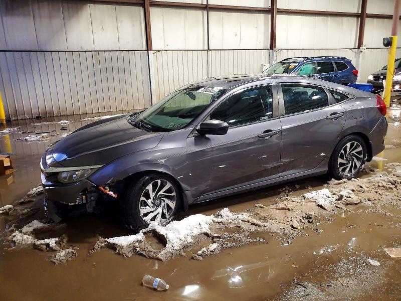 HONDA CIVIC EX 2018 with VIN 2HGFC2F72JH584434 - Photo from auction