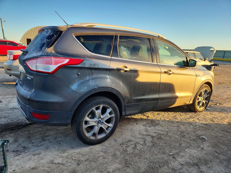 Photo 3 from auction – 2016 FORD ESCAPE TIT with VIN 1FMCU9J91GUA14586