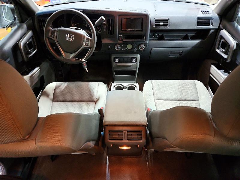 Photo 8 from auction – 2010 HONDA RIDGELINE with VIN 5FPYK1F43AB005393
