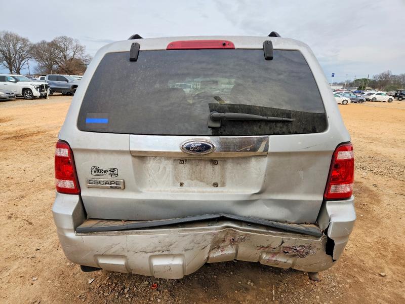 Photo 6 from auction – 2009 FORD ESCAPE LIM with VIN 1FMCU04G49KC34633