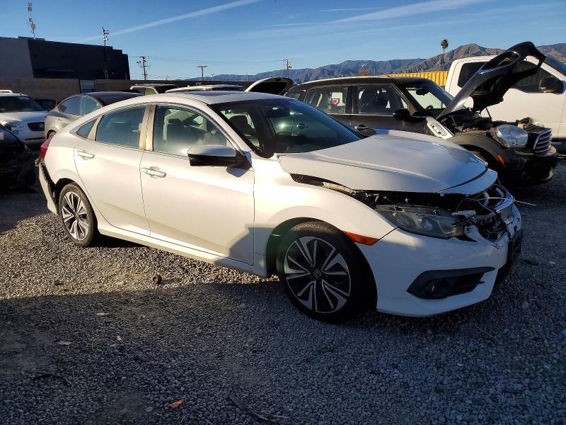 Photo 4 from auction – 2016 HONDA CIVIC EX with VIN 19XFC1F39GE200353