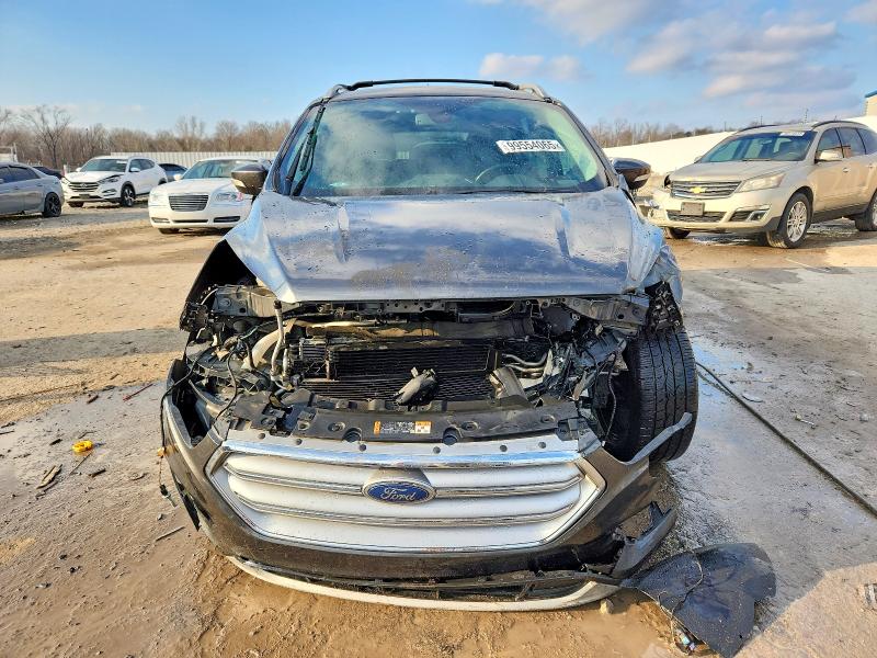 Photo 5 from auction – 2017 FORD ESCAPE TIT with VIN 1FMCU0J97HUA59657
