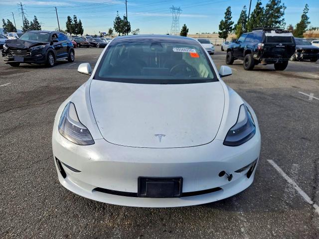 Photo 5 from auction – 2021 TESLA MODEL 3 with VIN 5YJ3E1EA4MF873960