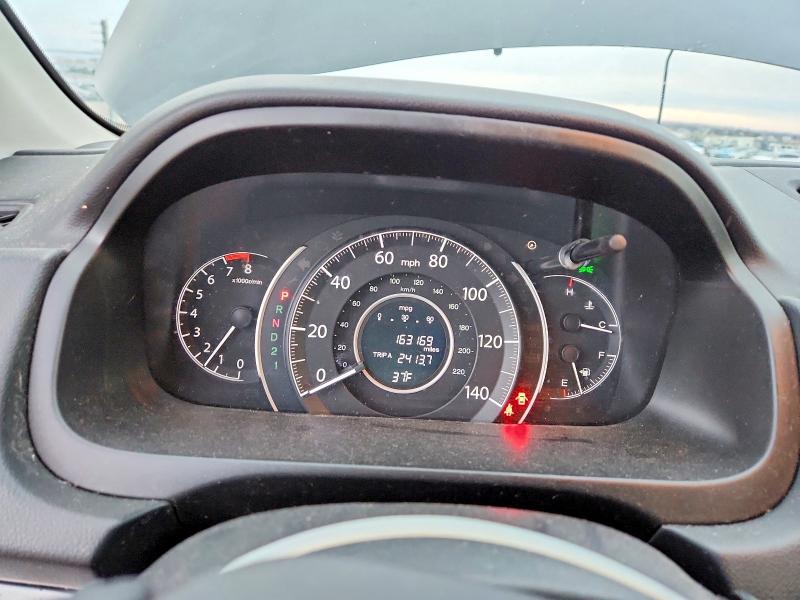 Photo 9 from auction – 2014 HONDA CR-V LX with VIN 2HKRM3H33EH555305
