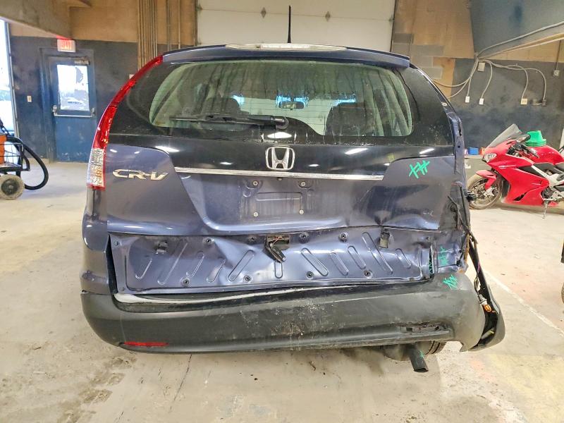 Photo 6 from auction – 2014 HONDA CR-V LX with VIN 2HKRM3H31EH557781
