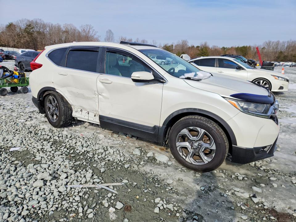 Photo 4 from auction – 2018 HONDA CR-V with VIN 2HKRW1H53JH507023