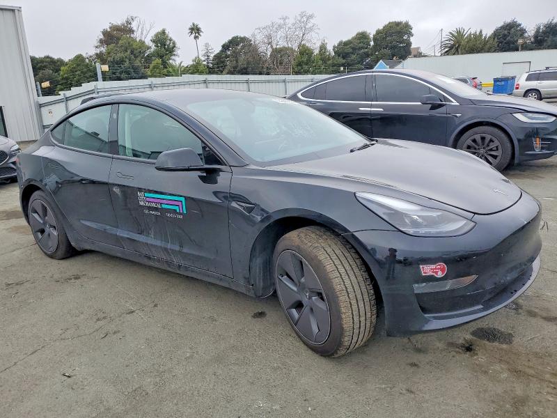 Photo 4 from auction – 2023 TESLA MODEL 3 with VIN 5YJ3E1EA7PF616215