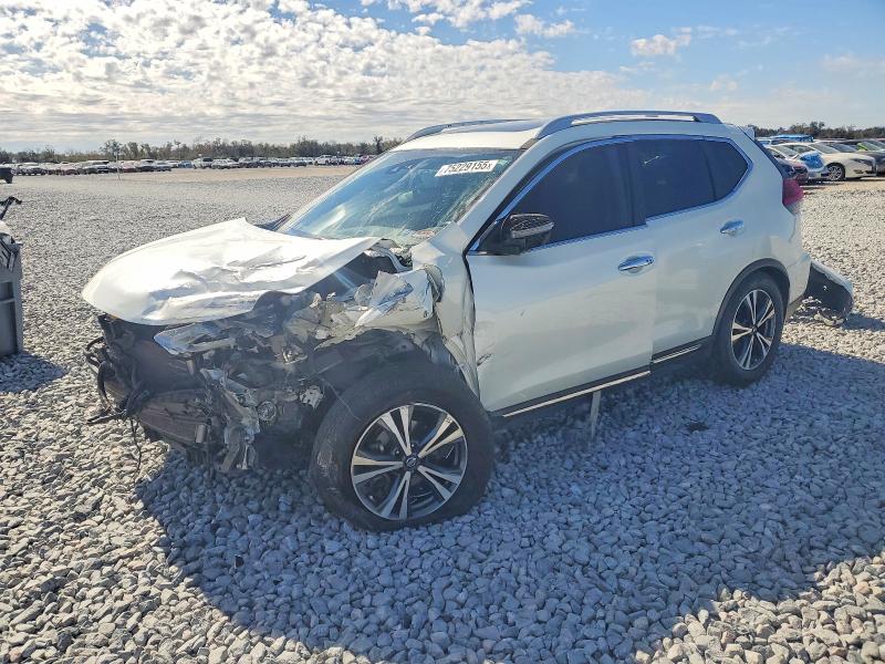 NISSAN ROGUE 2017 with VIN 5N1AT2MT4HC854989 - Photo from auction