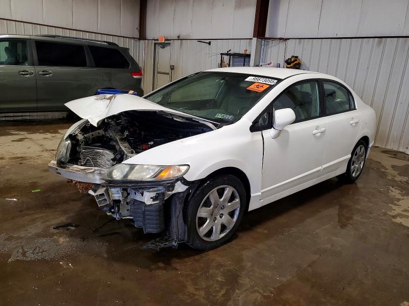 HONDA CIVIC LX 2011 with VIN 2HGFA1F58BH533102 - Photo from auction