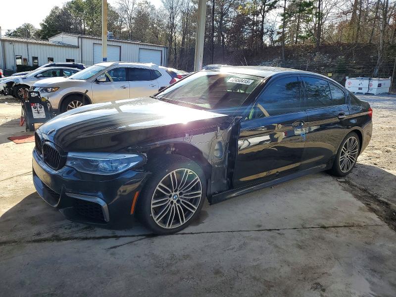 BMW M550XI 2018 with VIN WBAJB9C58JB286144 - Photo from auction