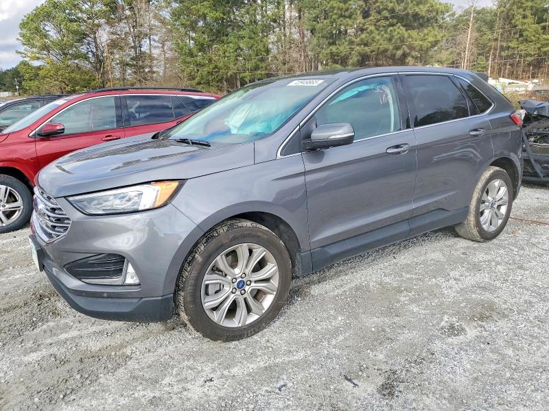 FORD EDGE TITAN 2022 with VIN 2FMPK4K97NBB04885 - Photo from auction