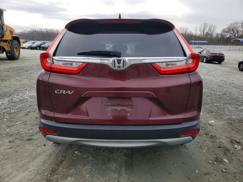 Photo 6 from auction – 2018 HONDA CR-V with VIN 7FARW1H57JE051157