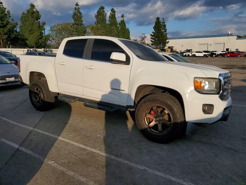 Photo 4 from auction – 2015 GMC CANYON SLE with VIN 1GTG5BEA2F1134217