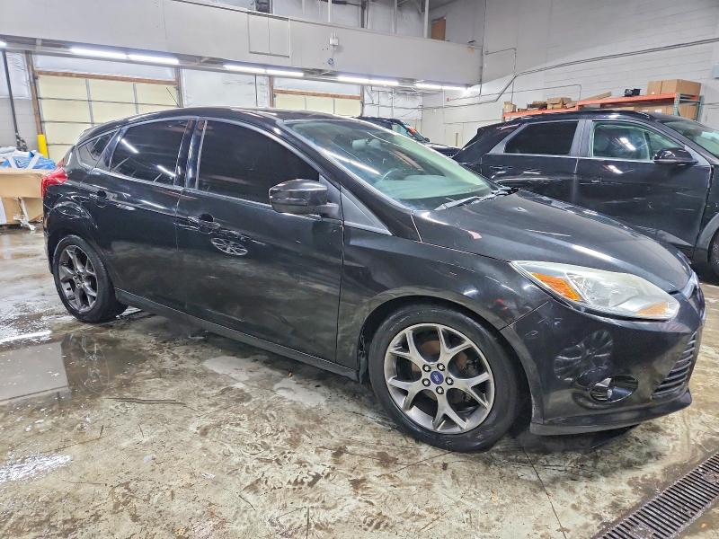 Photo 4 from auction – 2014 FORD FOCUS with VIN 1FADP3K24EL274293