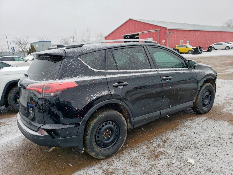Photo 3 from auction – 2017 TOYOTA RAV4 LE with VIN 2T3BFREV4HW610894