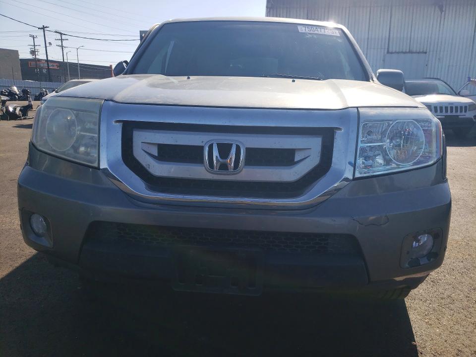 Photo 5 from auction – 2009 HONDA PILOT TOUR with VIN 5FNYF38959B020328