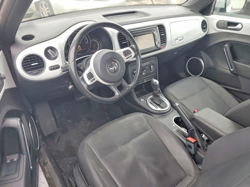 Photo 8 from auction – 2014 VOLKSWAGEN BEETLE with VIN 3VWJ17AT5EM667215