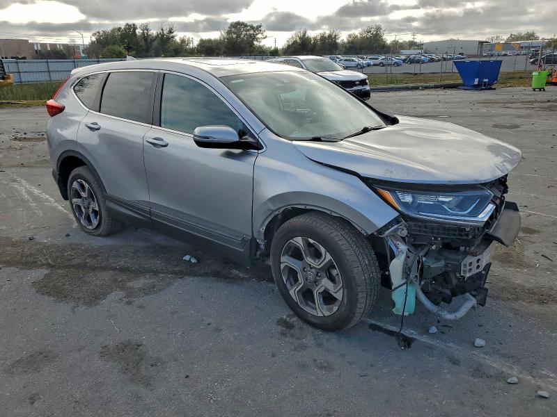 Photo 4 from auction – 2017 HONDA CR-V EX with VIN 7FARW1H51HE034607