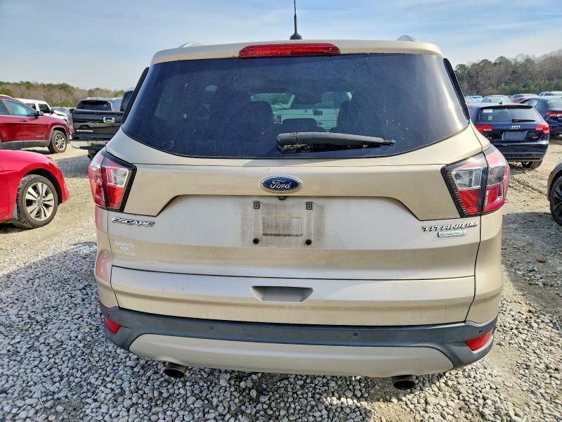 Photo 6 from auction – 2017 FORD ESCAPE with VIN 1FMCU0J92HUB73176