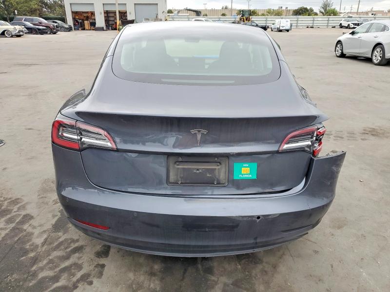 Photo 6 from auction – 2022 TESLA MODEL 3 with VIN 5YJ3E1EA9NF327978