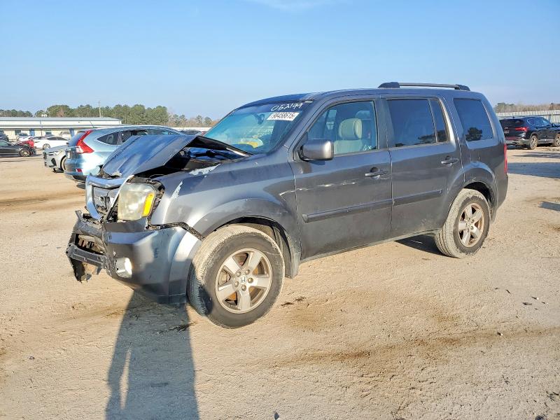 HONDA PILOT EXL 2011 with VIN 5FNYF3H6XBB052199 - Photo from auction