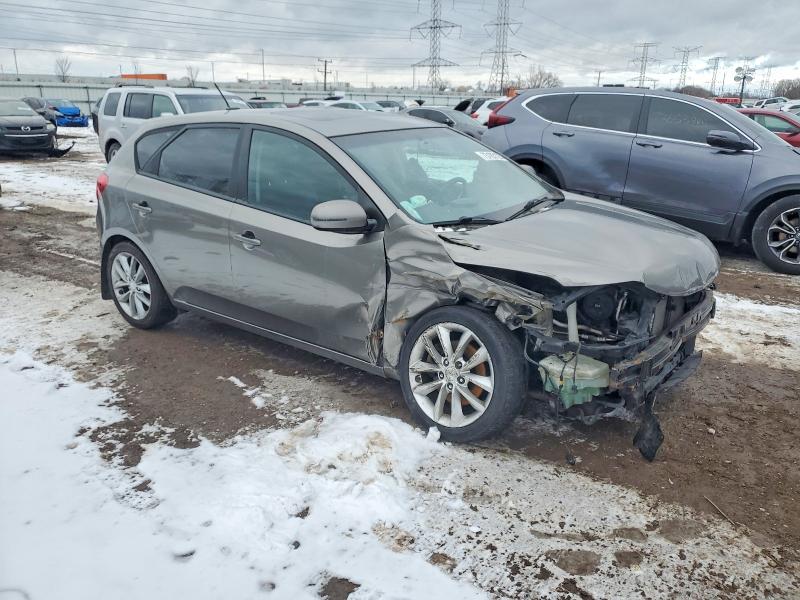 Photo 4 from auction – 2011 KIA FORTE with VIN KNAFW5A34B5423665