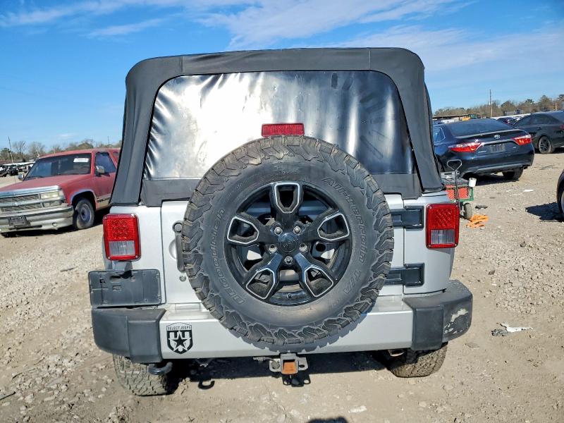 Photo 6 from auction – 2011 JEEP WRANGLER U with VIN 1J4BA7H16BL590907
