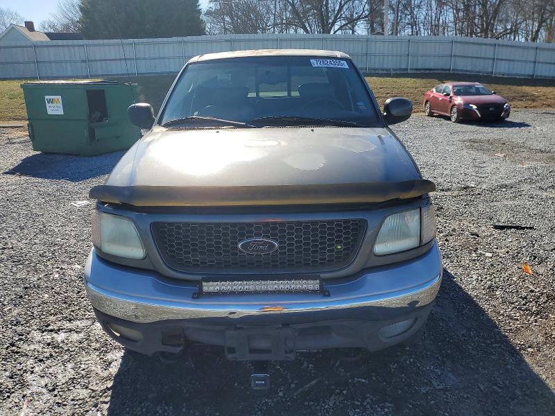 Photo 5 from auction – 2003 FORD F150 SUPER with VIN 1FTRW08L03KB31913