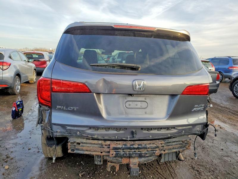 Photo 6 from auction – 2016 HONDA PILOT with VIN 5FNYF6H04GB057001