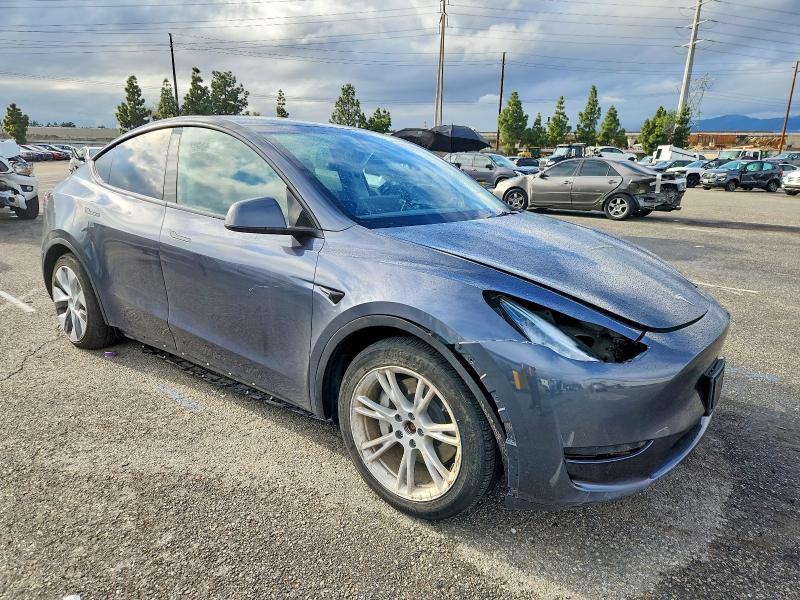 Photo 4 from auction – 2023 TESLA MODEL Y with VIN 7SAYGDEE0PA111668