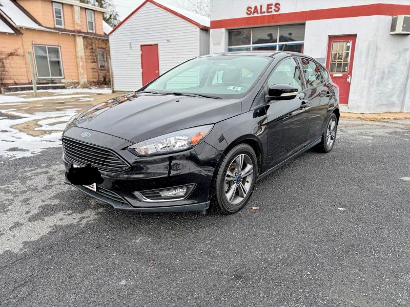 Фото 2 с аукциона – 2016 FORD FOCUS SE с VIN 1FADP3KE0GL371522