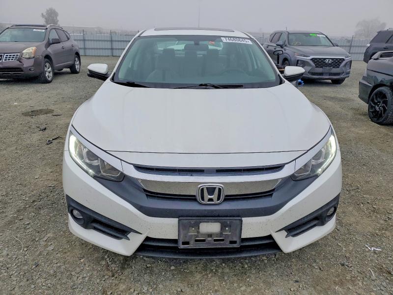 Photo 5 from auction – 2017 HONDA CIVIC EX with VIN 19XFC1F36HE213739