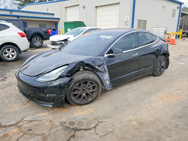TESLA MODEL 3 2018 with VIN 5YJ3E1EA7JF123111 - Photo from auction