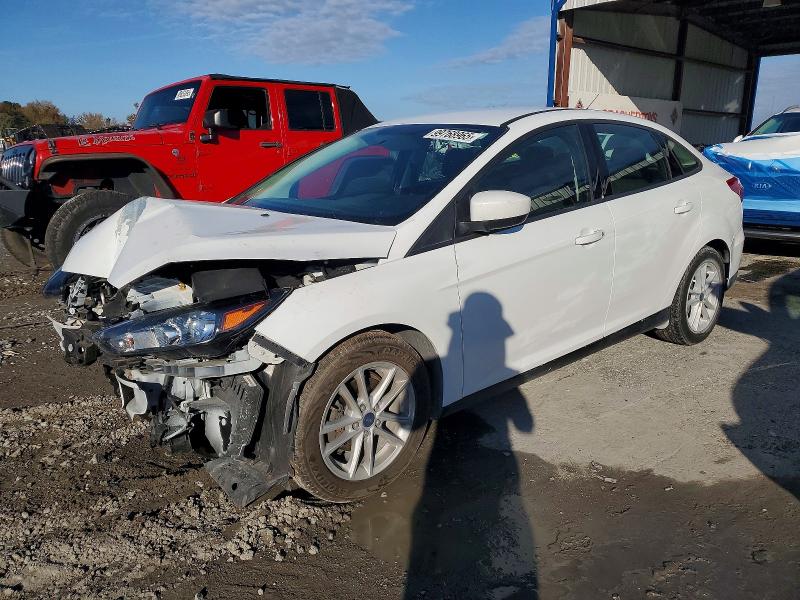 FORD FOCUS SE 2018 with VIN 1FADP3F23JL327795 - Photo from auction