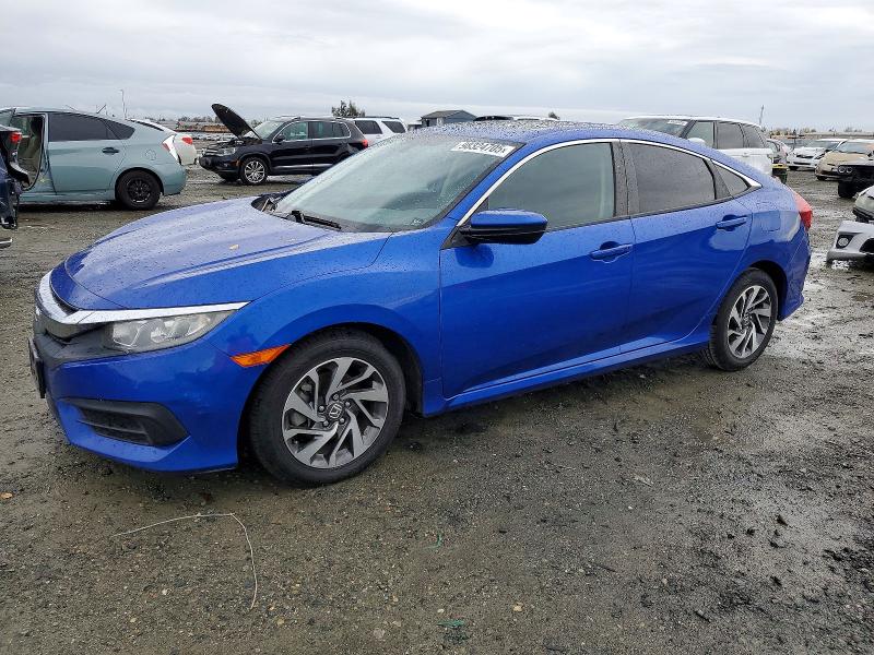 HONDA CIVIC EX 2018 with VIN 2HGFC2F74JH514448 - Photo from auction